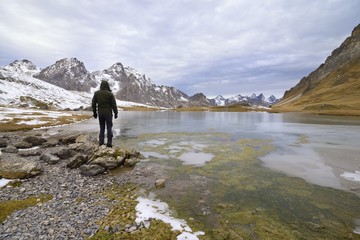 A lone hiker in the Alps, France