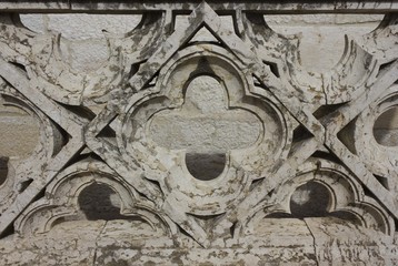 Architectural close up of the ornamental stone balustrade of Belem Tower in Lisbon, in typical...
