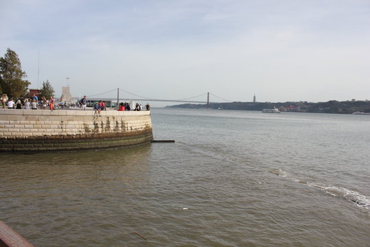 View from Belem Tower of Tagus river, with Cristo Rei, 25th of April Bridge and Monument to the discovery in the background