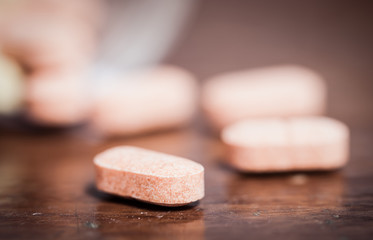 Fototapeta na wymiar closeup medicine vitamin capsule