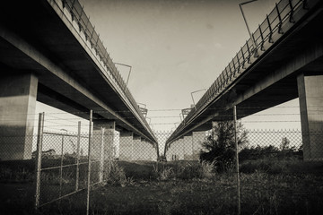The Gateway Bridge (Sir Leo Hielscher Bridges) at sunset in Brisbane, Queensland, Australia. Abstract black and white image.