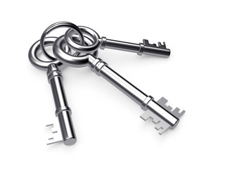 Bunch of three old silver keys isolated on white background
