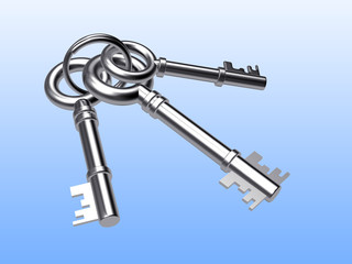 Bunch of three old silver keys on blue background