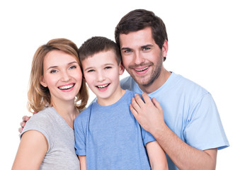 Portrait of the happy parents with son looking at camera - isolated on white background
