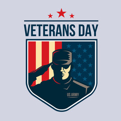 Veterans Day - Shield with Soldier saluting against USA Flag.