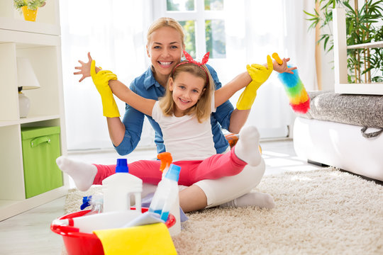 Smiling Adorable Family Ready For Cleaning House