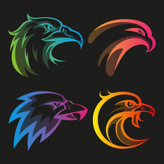 Colorful eagle head logos with rainbow gradients set on black background