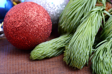 Decorated christmas tree - holiday background, green tree eve branch close up with christmas balls