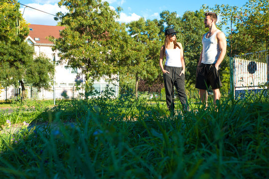 Young couple talking in a urban environment.
