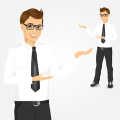 modern young businessman showing something