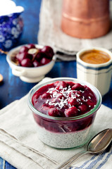 Chia seed pudding, dessert with cherries and granola. 