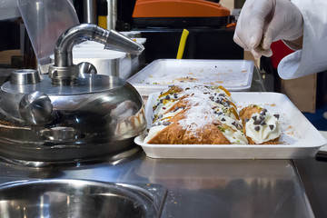 Sicilian cannoli filled of creamy  sweet ricotta - San Vito lo Capo, Cous cous Festival