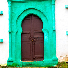 old door in morocco africa ancien and wall ornate green