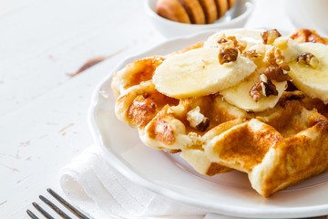 Waffles with banana and nuts honey
