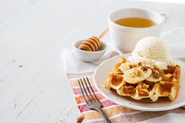 Waffles with banana and nuts honey