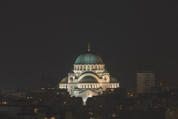 Night view of Belgrade, Serbia. The Church of Saint Sava is one of the largest Orthodox churches in...