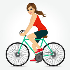 Fototapeta na wymiar friendly young girl riding bicycle happy 