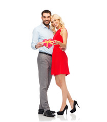 happy couple with red heart shaped gift box