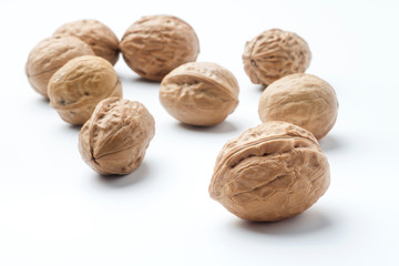 Fresh walnuts on a white background