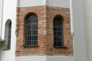 Fototapeta na wymiar Open the old brick walls of St. Sophia Cathedral. Velikiy Novgor