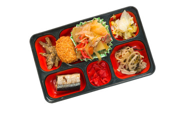 Japan Food set of grilled fish and other in a box isolated on wh