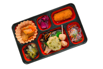 Japan Food set of salmon grilled and other in a box isolated on