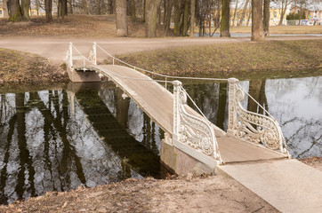  The Suspension (Tryasuchev) bridge,1825,  in Alexander Park, Tsarskoye Selo. Russia. 