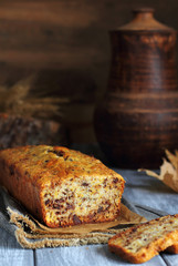 cut pumpkin cake with chocolate on the gray boards