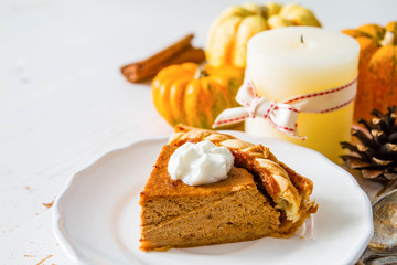 Pumpkin pie, white wood background