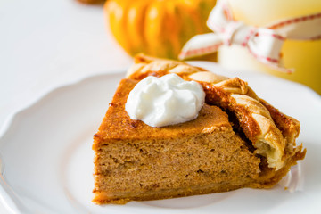 Pumpkin pie, white wood background