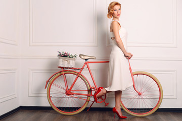 beautiful young woman with blond hair in retro style