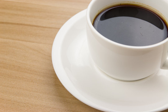 Coffee cup on the desk