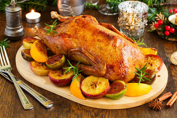Festive Christmas duck baked with apples and figs.