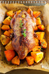 Roast duck with pumpkin and oranges.
