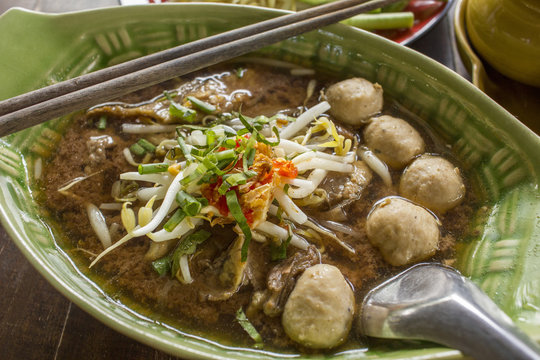 Thai noodle soup. Serve with Basil, bean Sprouts. (Kuay Tiew Ruer)
Noodle and casseroled beef  - Thailand food
