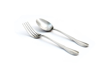 silver spoon and fork isolated in white background