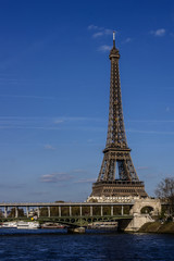 Fototapeta premium River Seine Embankment with Eiffel Tower (La Tour Eiffel). Paris