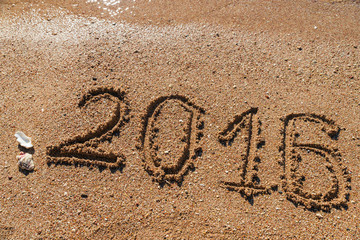 New Year 2016  concept on the sea beach.