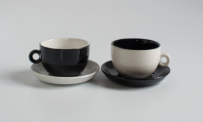 Black and white small cups