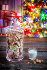 Tasty and sweet gingerbread cookies with milk