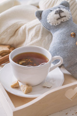 Tea tray and sweater