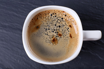 Cup of coffee on table close up