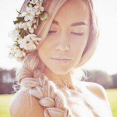 Romantic lady in wreath of apple trees