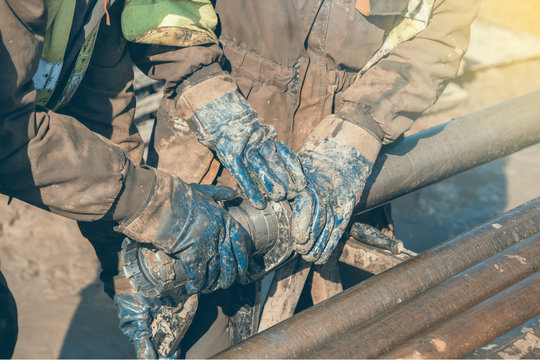 Worker Hands Checks A Diamond Core Drill Bit 2