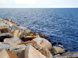 Fototapeta na wymiar huge granite stones as breakwater on Hel peninsula Baltic sea coast