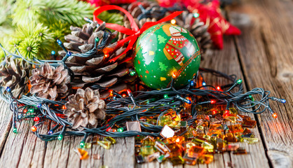 Naklejka premium Christmas decoration with pine and cones