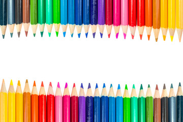 color pencils on book line closed-up