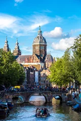 Foto op Plexiglas Canal and St. Nicolas Church in Amsterdam © Sergii Figurnyi