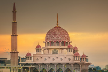 Fototapeta na wymiar Sunset over Putrajaya Mosque and Panorama of Kuala Lumpur