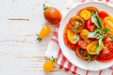 Colorful tomato salad basil 
